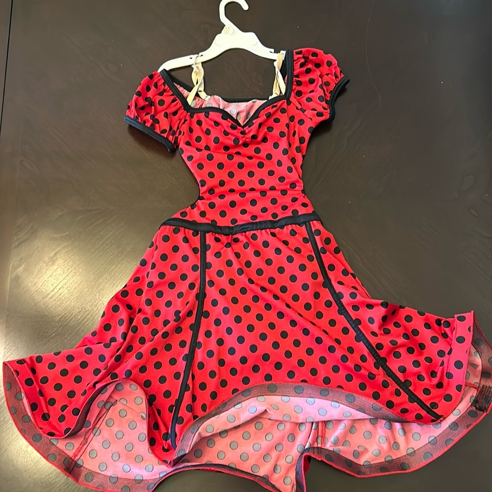 Red and black polkadot costume